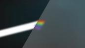 How do prisms create rainbows?