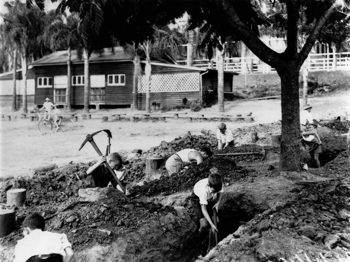 Students digging trenches at Ascot State School, Brisbane, 1942